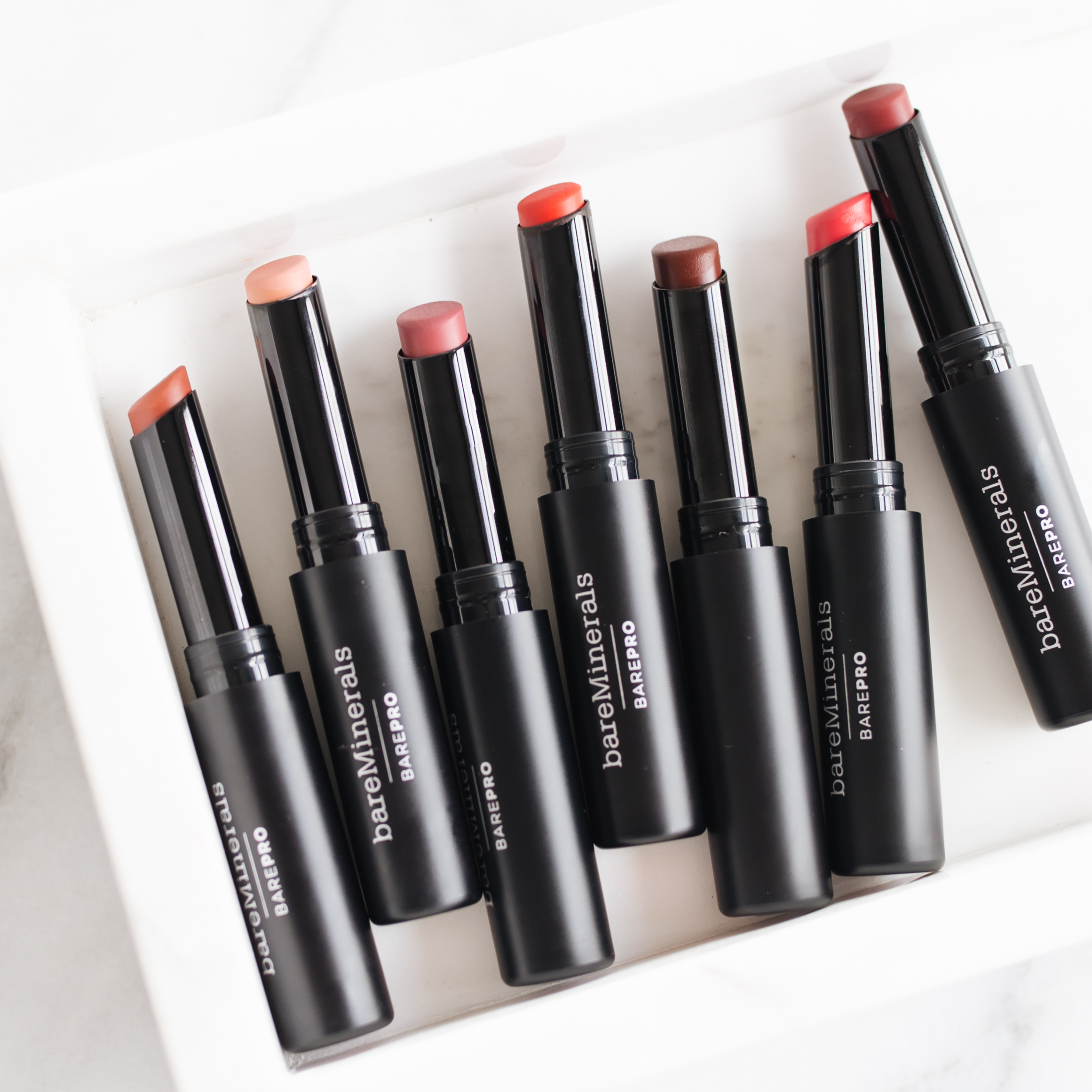 bareMinerals BAREPRO Longwear Lipstick Review + Swatches | Twinspiration